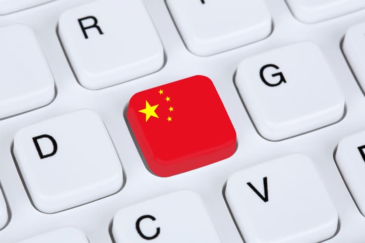 China flag online internet on computer keyboard