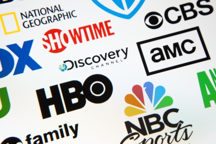 Collection logotypes of most famous brands in the world on LCD monitor. HBO, Fox, AMC, Showtime, Discovery, Animal Planet, ABC, CBS, TLC and more