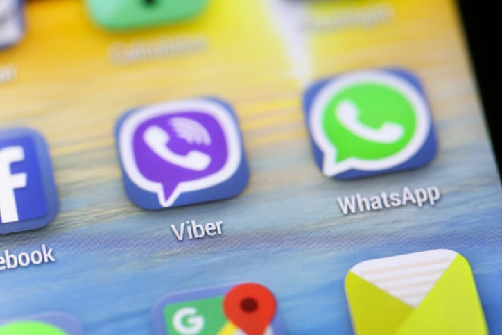 Various apps (Facebook, Viber, WhatsApp, Google Maps, Email) on an android smartphone touchscreen, with two popular messaging apps Viber and WhatsApp in the center